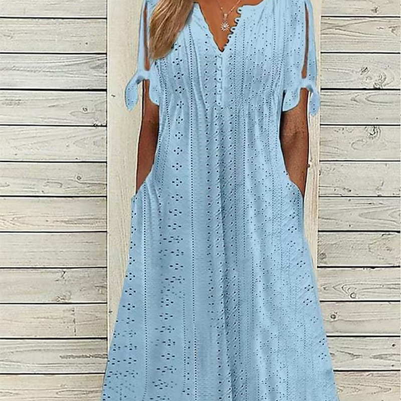 Elegantes Kleid mit V-Ausschnitt und durchbrochenen Details